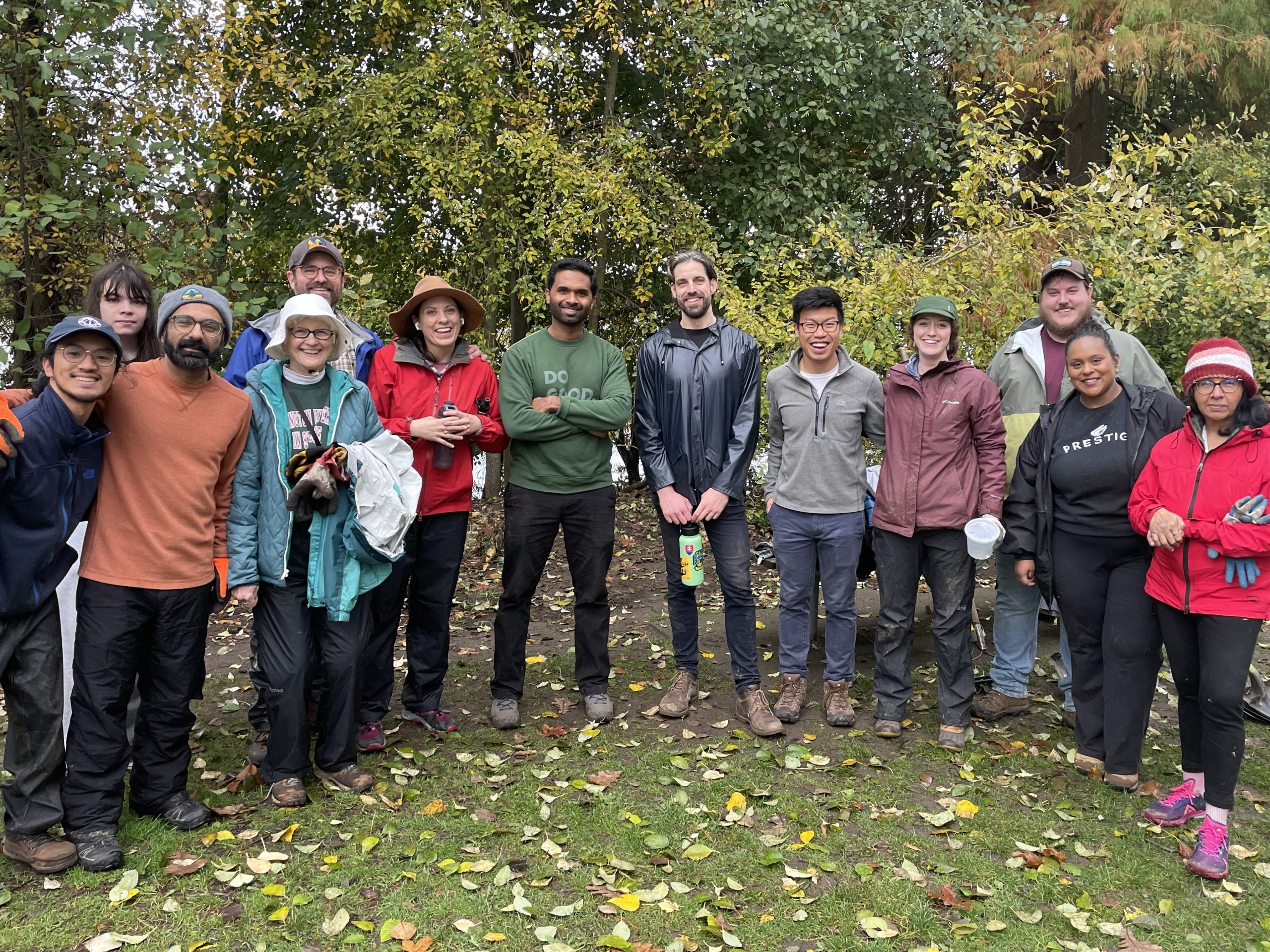 Group photo at Green Lake park with about 15 people. 
